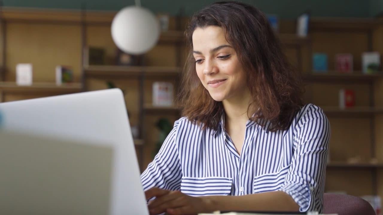 A student studying on her laptop at Connections Academy